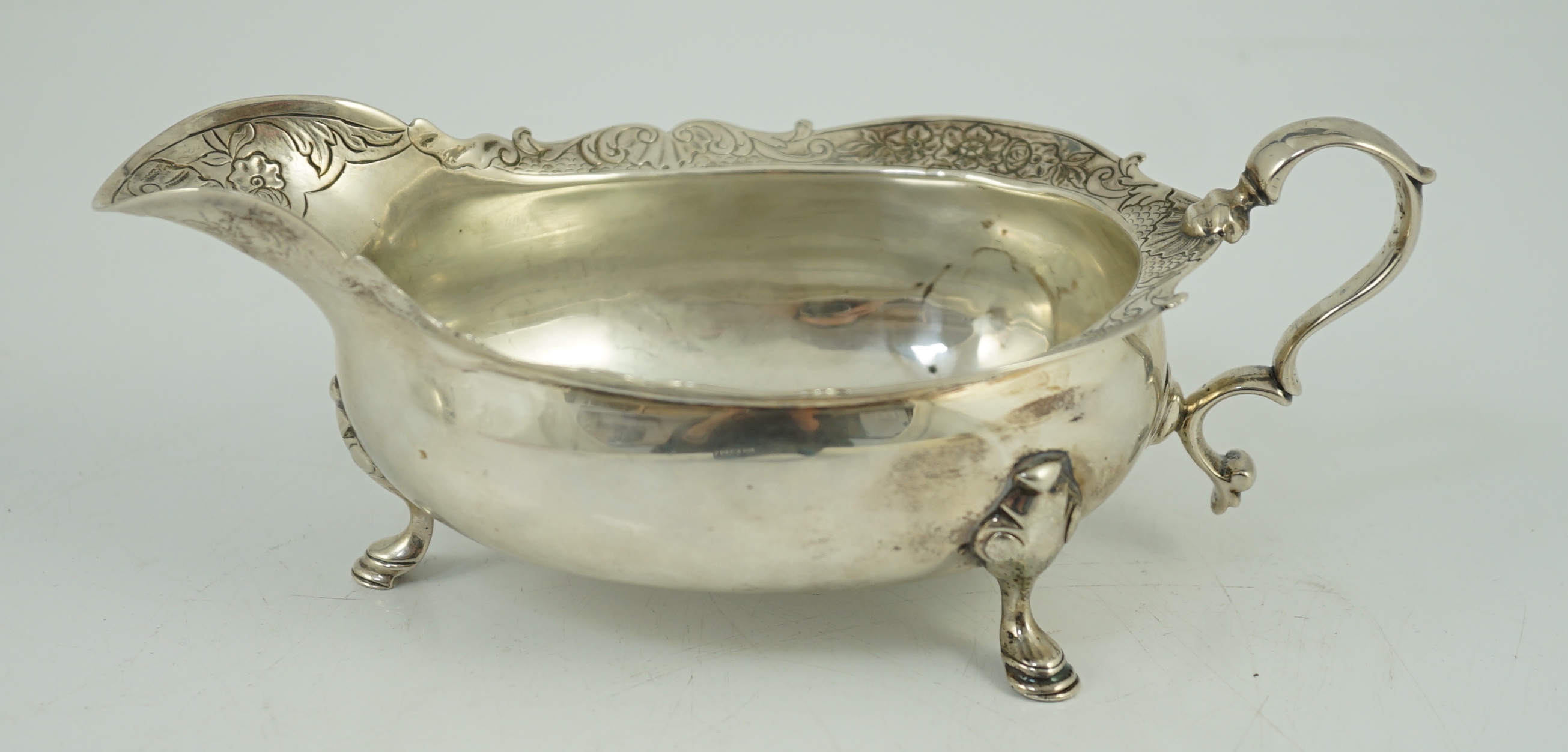 A George II Scottish silver sauce boat by Edward Lothian